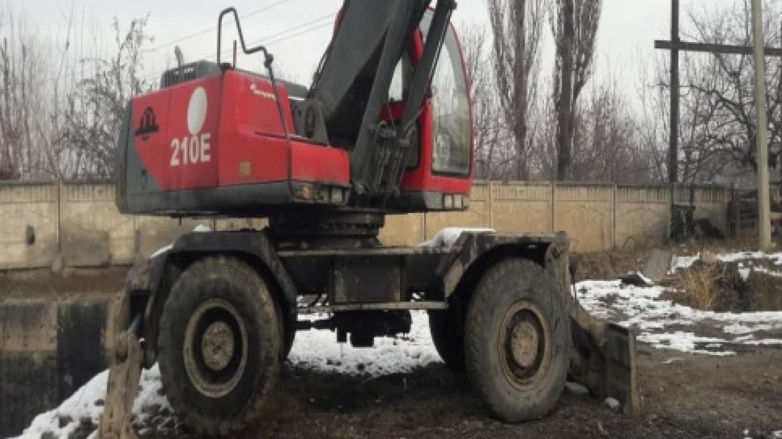 Экскаватор Е-210