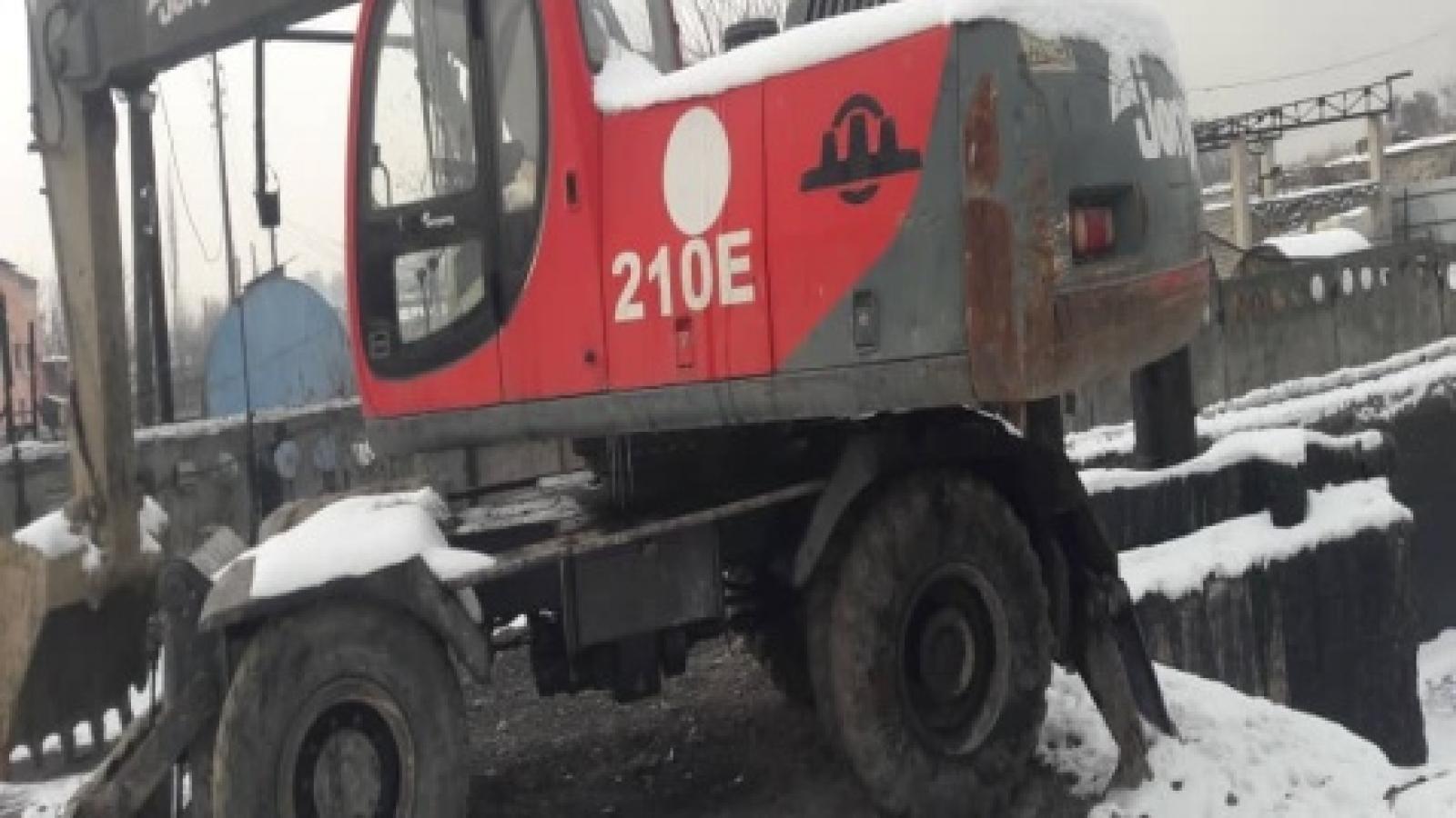 Экскаватор Е-210